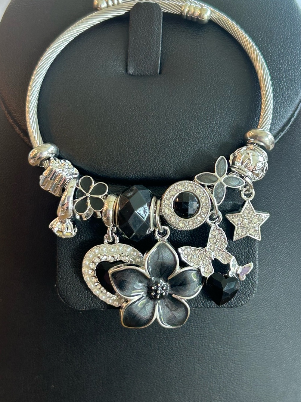 Brand New Silver-Tone Flower & Charm Bracelet with Black Accents